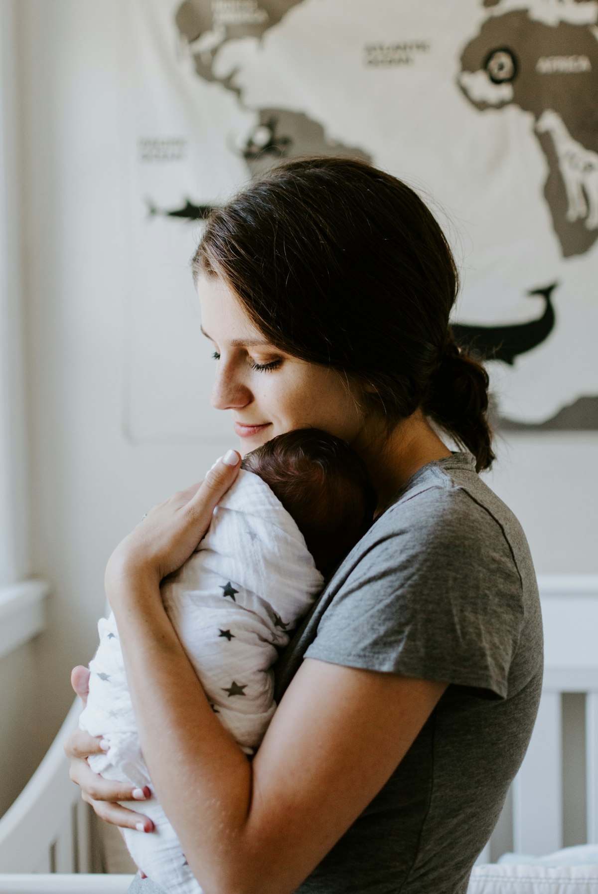 A mother holding her baby
